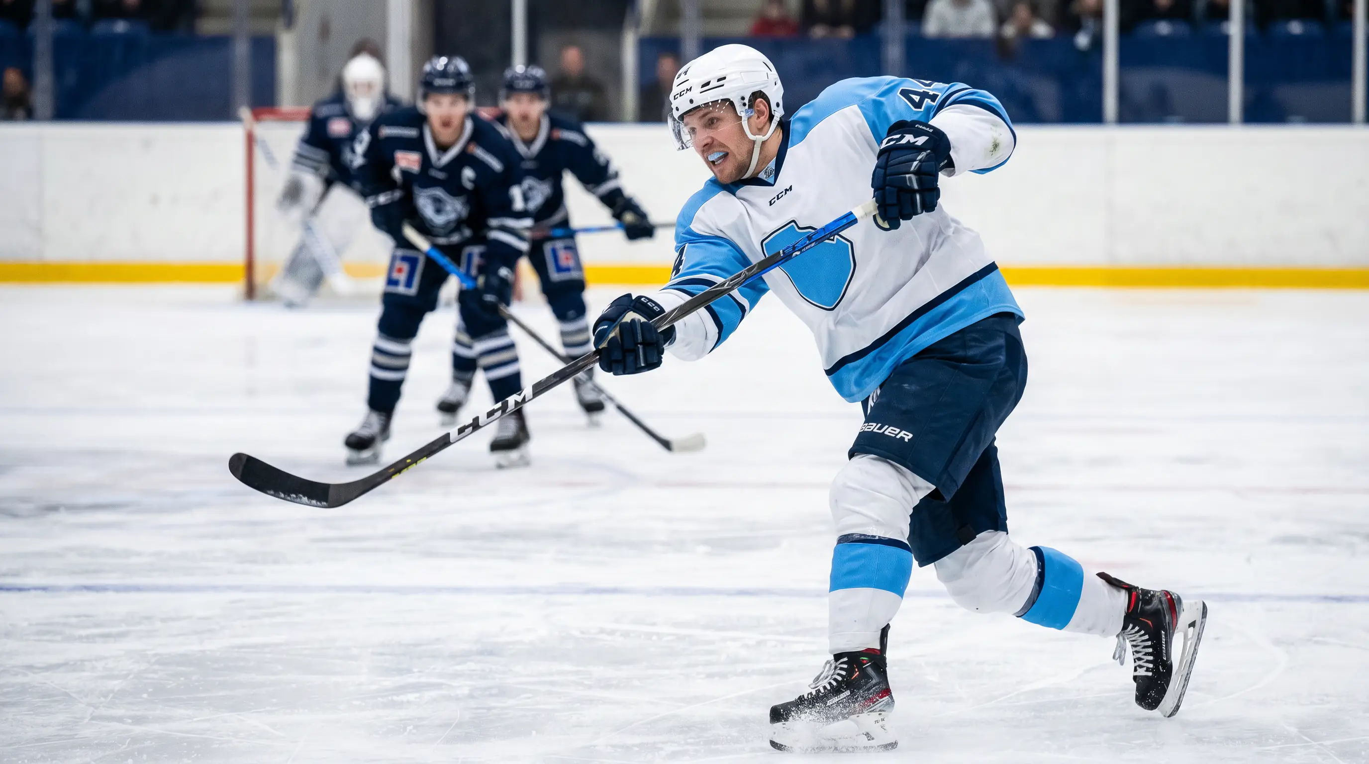 NHL defenceman taking a slap shot from the point during a top-six opportunity