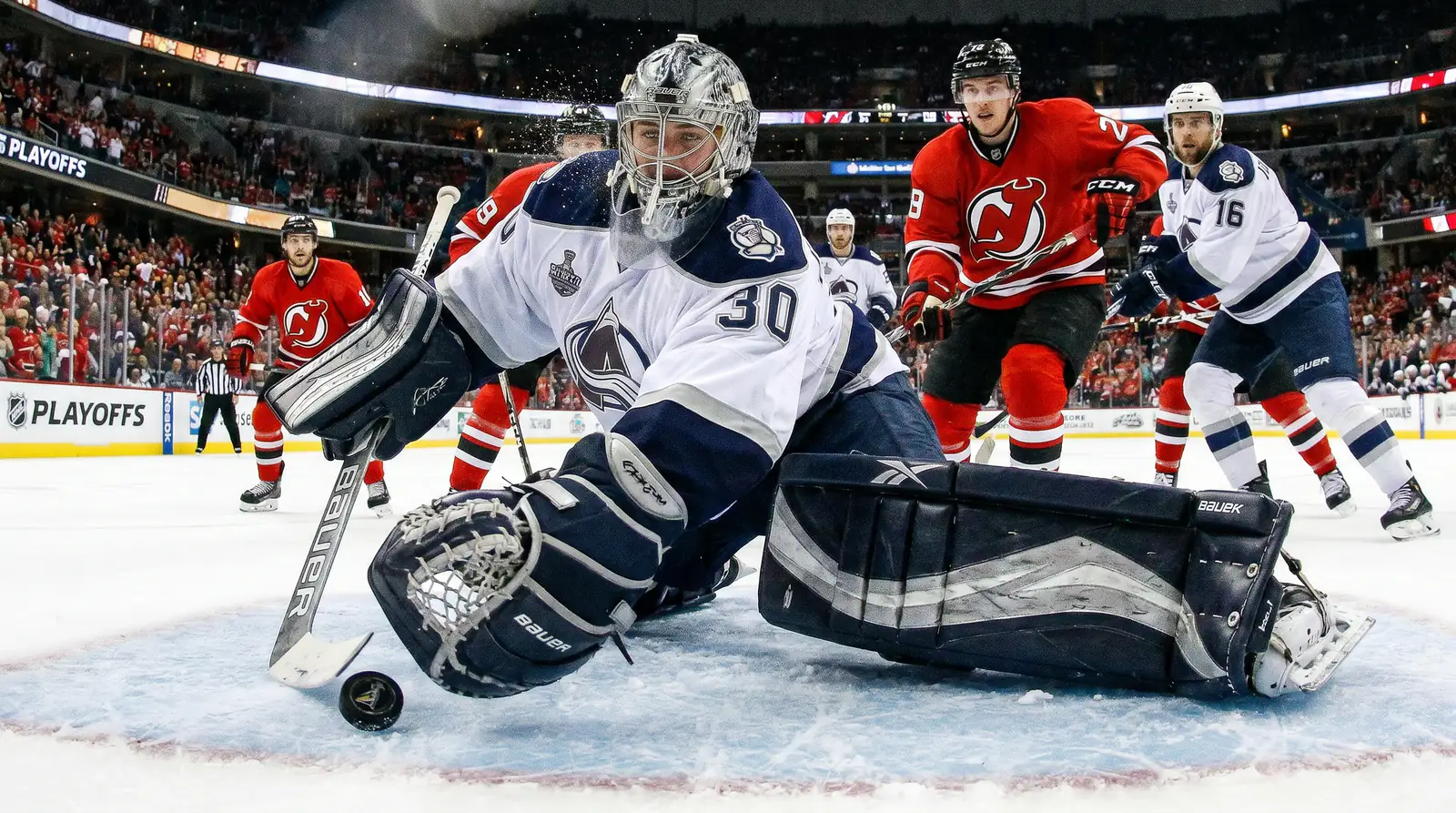 NHL playoff goaltender making a big save during a critical Game 6 sequence